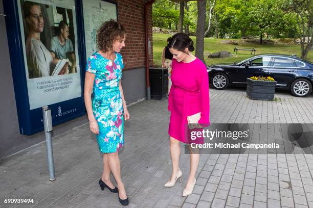 Princess Sofia of Sweden is greeted by Johanna Adami, director of the Sophiahemmet college while attending a merit ceremony at Sophiahemmet College...