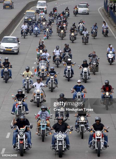 More than 100 members of the Harley Davidson and Royal Enfield Bikers group with supporters of Anna Hazare at a bike rally from Bandra Bandstand to...
