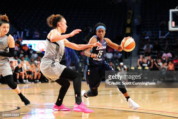 Tiffany Hayes of the Atlanta Dream handles the ball during the game against the San Antonio Stars on May 31, 2017 at McCamish Pavilion in Atlanta,...