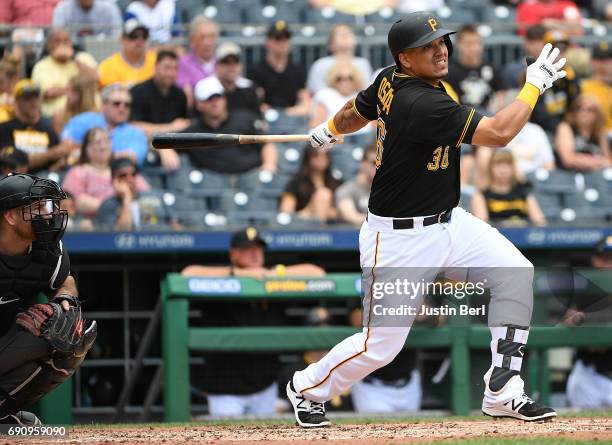 Jose Osuna of the Pittsburgh Pirates hits an RBI double to right field in the fifth inning during the game against the Arizona Diamondbacks at PNC...