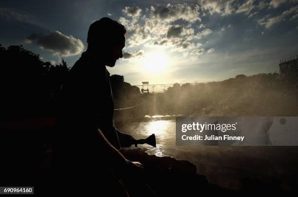 Groundman water the courts on day four of the 2017 French Open at Roland Garros on May 31, 2017 in Paris, France.