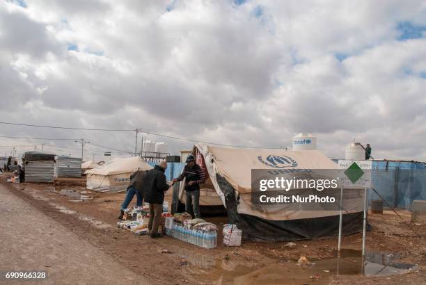 Syrian refugees are seen at the Zaatari refugee camp, on the Jordanian border on 31 May 2017. It's the second refugee camp in the world . The field...