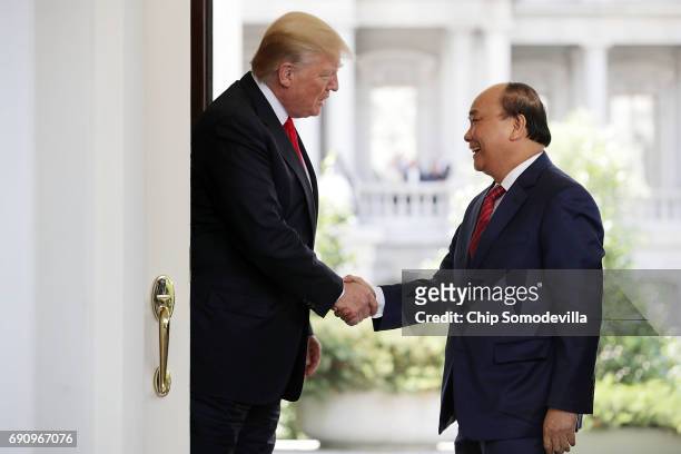 President Donald Trump welcomes Vietnamese Prime Minister Nguyen Xuan Phuc to the White House May 31, 2017 in Washington, DC. According to Phuc, the...