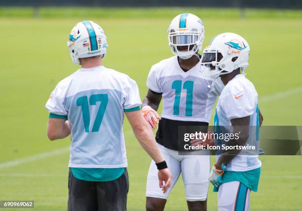 Miami Dolphins Quarterback Ryan Tannehill , Miami Dolphins Wide Receiver DeVante Parker and Miami Dolphins Wide Receiver Jarvis Landry during a...