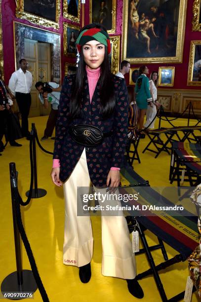 Yoyo Cao attends the Gucci Cruise 2018 fashion show at Palazzo Pitti on May 29, 2017 in Florence, Italy.