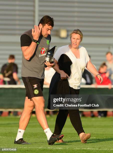 Emma Hayes of Chelsea albs off at half time during a WSL 1 match between Bristol City Women and Chelsea Ladies at the Stoke Gifford Stadium on May...