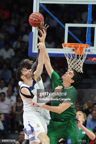 Rudy Fernandez, #5 guard of Real Madrid and Carlos Suarez, #43 forward of Unicaja during the Liga Endesa Semi Final game between Real Madrid and...