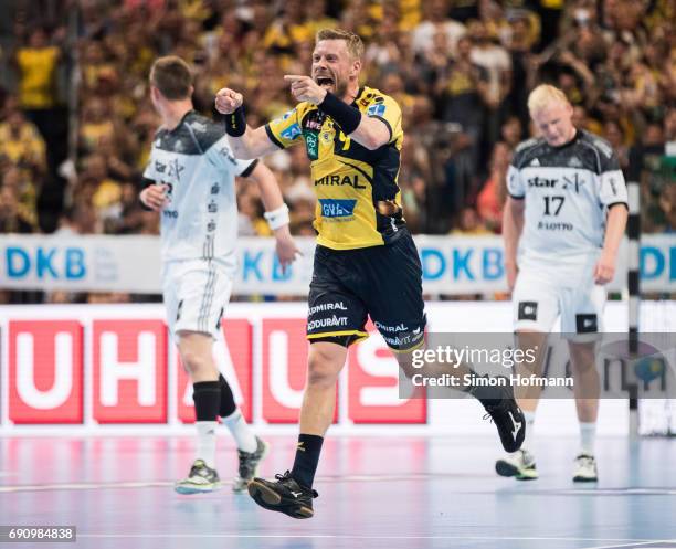 Gudjon Valur Sigurdsson of Rhein-Neckar Loewen celebrates during the DKB HBL match between Rhein-Neckar Loewen and THW Kiel at SAP Arena on May 31,...