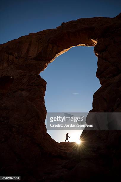 a man hiking in utah - 33 arches stock pictures, royalty-free photos & images