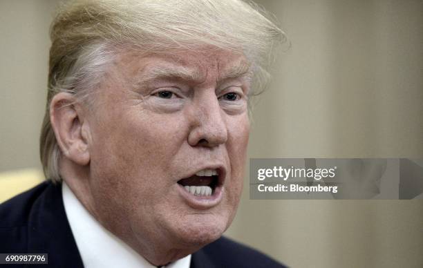 President Donald Trump speaks to members of the media during a meeting with Nguyen Xuan Phuc, Vietnam's prime minister, not pictured, in the Oval...