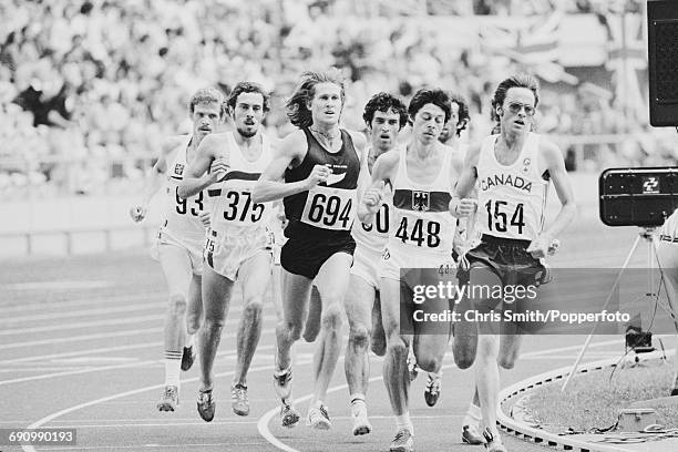 View of competition in the first semi-final of the Men's 1500 metres event with Steve Ovett of Great Britain on left, John Walker of New Zealand,...