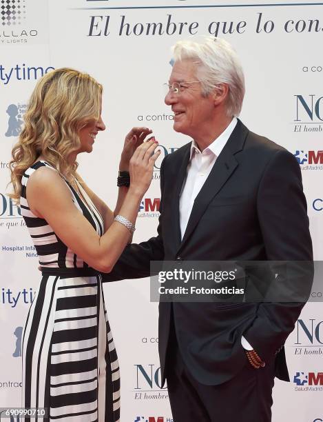 Alejandra Silva and Richard Gere attend the 'Norman: The Moderate Rise and Tragic Fall of a New York Fixer' premiere at the Callao cinema on May 31,...