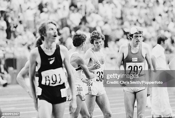 Competitors after the finish of the final of the Men's 5000 metres event, with from left to right, silver medallist Dick Quax of New Zealand , Ian...
