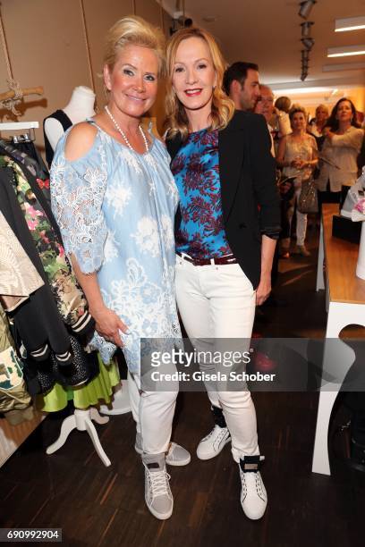 Claudia Effenberg and Katja Flint during the charity shopping night at CE design store on May 31, 2017 in Munich, Germany.