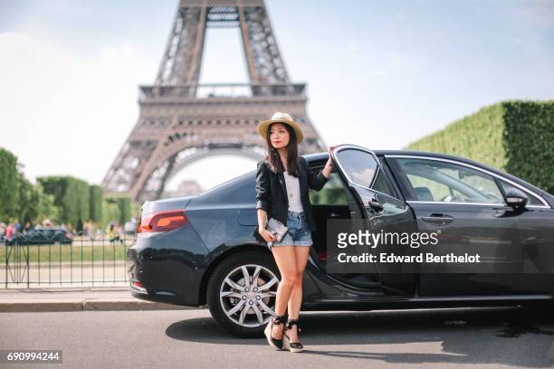 May Berthelot, fashion blogger and Head of Legal at Videdressing.com, wears a blazer jacket designed by herself, a New Look white t-shirt, a The...