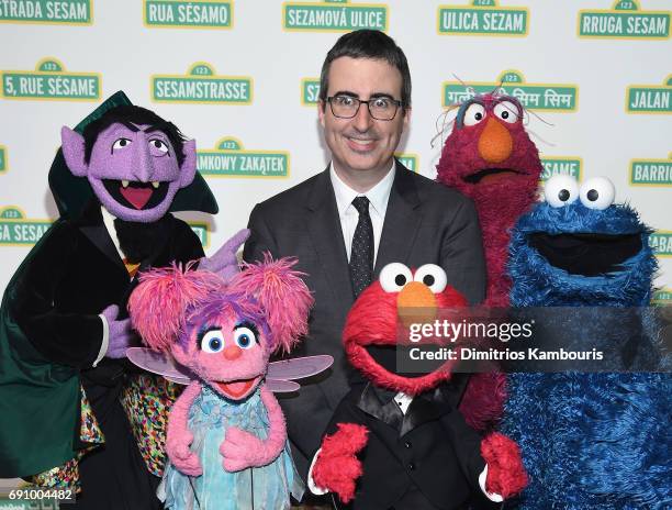 John Oliver and The Muppets attend The 2017 Sesame Workshop Dinner at Cipriani 42nd Street on May 31, 2017 in New York City.