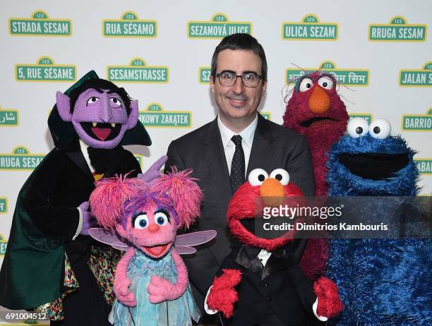 John Oliver and The Muppets attend The 2017 Sesame Workshop Dinner at Cipriani 42nd Street on May 31, 2017 in New York City.