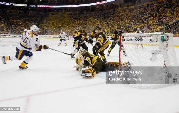 Pontus Aberg of the Nashville Predators scores a goal past Matt Murray of the Pittsburgh Penguins during the first period in Game Two of the 2017 NHL...