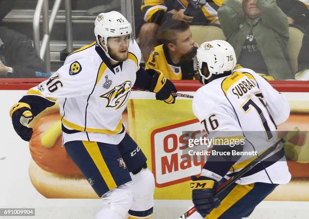 Pontus Aberg of the Nashville Predators celebreates with P.K. Subban after scoring a goal during the first period in Game Two of the 2017 NHL Stanley...