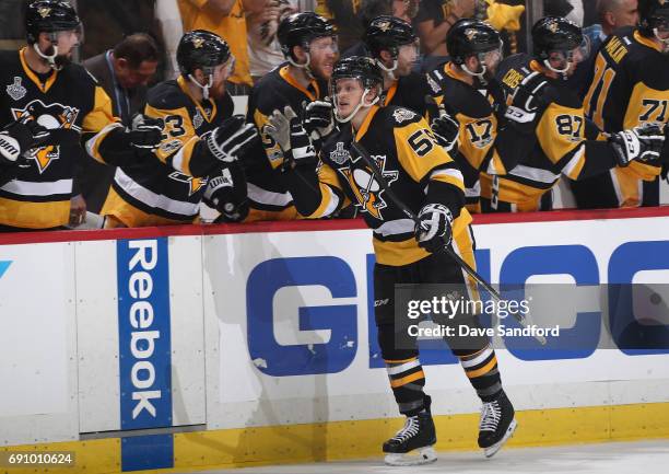 Jake Guentzel of the Pittsburgh Penguins celebrates his goal with teammates during the first period of Game Two of the 2017 NHL Stanley Cup Final...