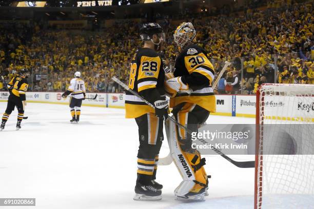 Matt Murray of the Pittsburgh Penguins hugs Ian Cole at the conclusion of the Pittsburgh Penguins 4-1 win over the Nashville Predators in Game Two of...