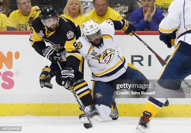 Brian Dumoulin of the Pittsburgh Penguins collides with P.K. Subban of the Nashville Predators during the second period of Game Two of the 2017 NHL...