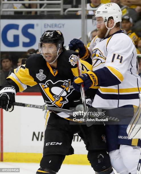Mattias Ekholm of the Nashville Predators shoves Matt Cullen of the Pittsburgh Penguins during the second period of Game Two of the 2017 NHL Stanley...