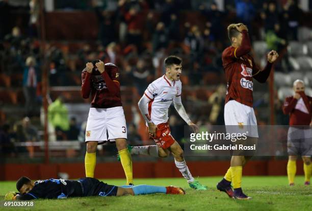 Ignacio Pussetto of Huracan celebrates the fourth goal of his team scored by Alejandro Romero Gamarra of Huracan during a second leg match between...