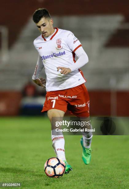 Ignacio Pussetto of Huracan drives the ball during a second leg match between Huracan and Deportivo Anzoategui as part of first round of Copa...