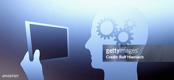 digital composite image of male with cogs in his head using digital tablet - holding tablet computer stock illustrations