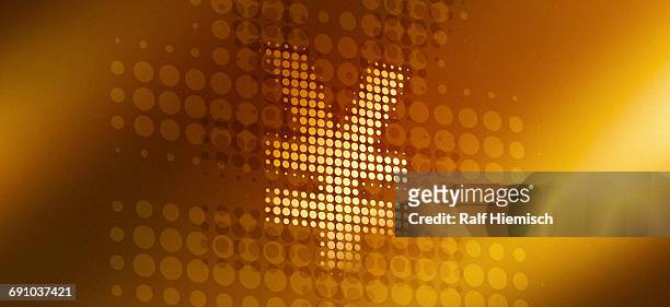 close-up of spotted yen sign over gold colored background - yen sign stock-grafiken, -clipart, -cartoons und -symbole