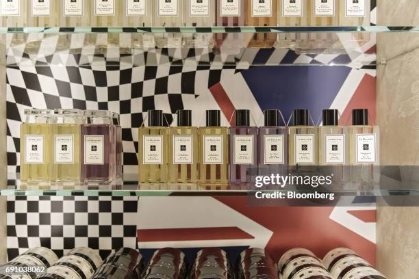 Bottles of fragrance sit on display at a Jo Malone Ltd. Store in the Raffles City shopping mall in Shanghai, China, on Wednesday, May 31, 2017....