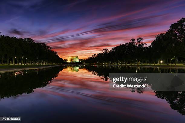 usa, washington dc, view to lincoln memorial at sunset - washington dc aerial stock-fotos und bilder