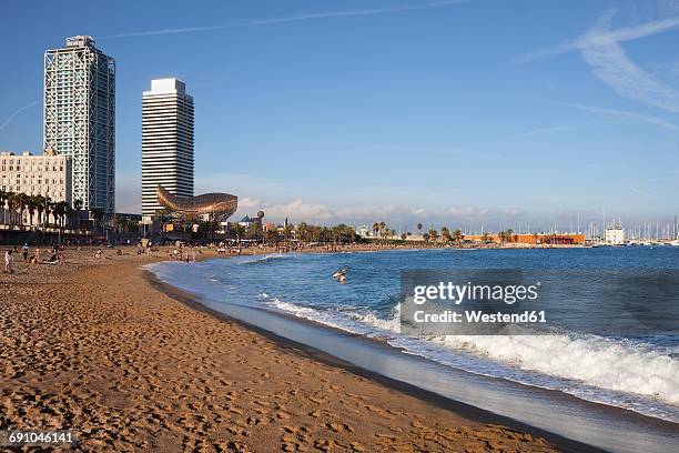 spain, barcelona, beach of la barceloneta - frank gehry stock pictures, royalty-free photos & images