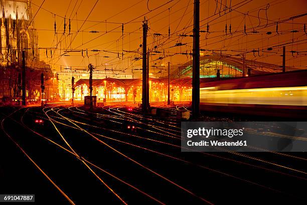 germany, cologne, central station at night - cologne stock pictures, royalty-free photos & images