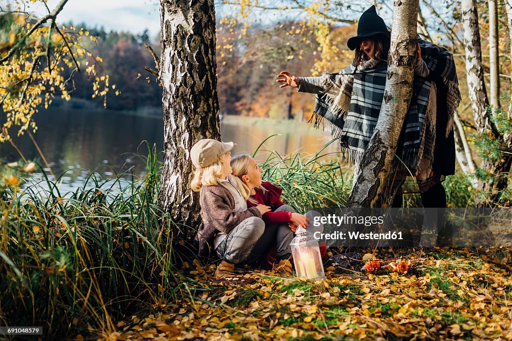 Hansel and Gretel, Witch scaring boy and girl sitting in forest