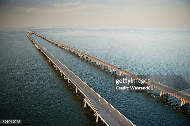 usa, aerial photograph of the chesapeake bay bridge tunnel - chesapeake bay bridge fotografías e imágenes de stock