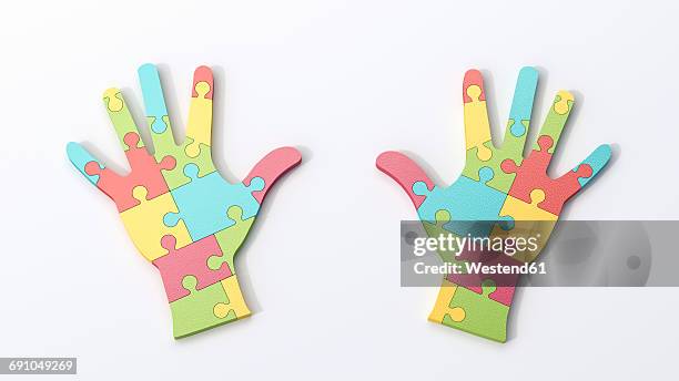 two multicolored puzzle hands - pair stock illustrations