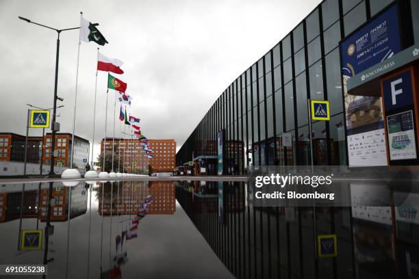 World flags fly outside the Congress Center ahead of the St. Petersburg International Economic Forum at the Expoforum in Saint Petersburg, Russia, on...