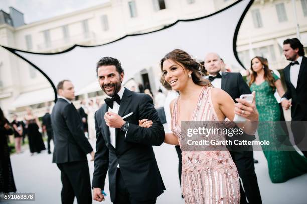 Eva Longoria and her husband Jose Baston attend the amfAR Gala Cannes 2017 at Hotel du Cap-Eden-Roc on May 25, 2017 in Cap d'Antibes, France.