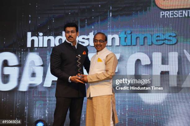 Ss Rathore Broadcasting Rajyavardhan Singh Rathore Photos and Premium High Res ...