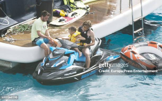 Real Madrid football player Luka Modric and his son Ivano Modric are seen on May 29, 2017 in Ibiza, Spain.