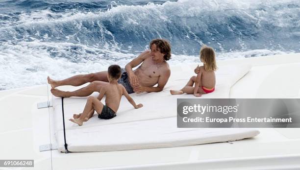 Real Madrid football player Luka Modric and his kids Ivano Modric, Ema Modric are seen on May 29, 2017 in Ibiza, Spain.