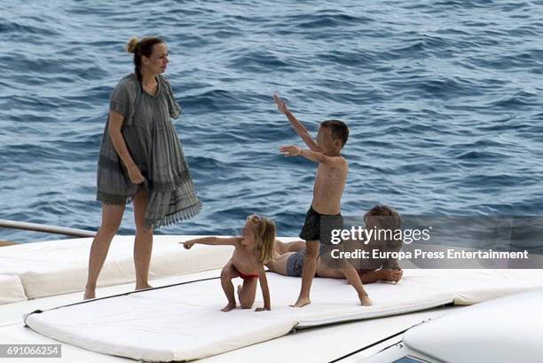 Real Madrid football player Luka Modric, his wife Vanja Bosnic Modric and his kids Ivano Modric, Ema Modric are seen on May 29, 2017 in Ibiza, Spain.