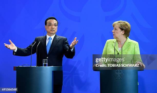 German Chancellor Angela Merkel and the Chinese Prime Minister Li Keqiang give a joint press conference after representatives of both countries...