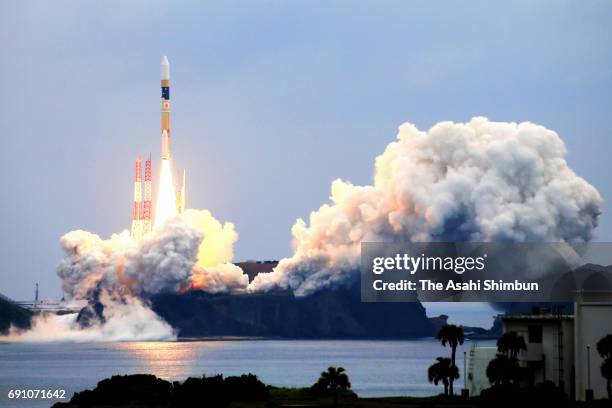 Carrying the Quasi-Zenith Satellite Michibiki No.2 lifts off from the Japan Aerospacec Exploration Agency Tanegashima Space Center on June 1, 2017 in...