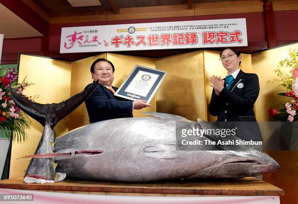 Kiyoshi Kimura , president of Kiyomura Corp receives the Guinness World Records certificate from an official on June 1, 2017 in Tokyo, Japan. The...