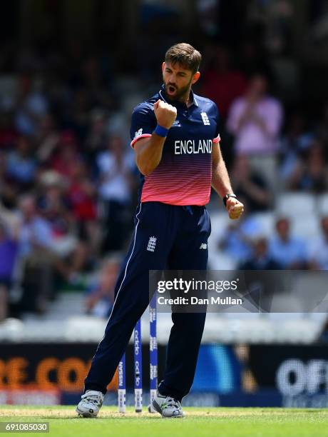 Liam Plunkett of England celebrates taking the wicket of Imrul Kayes of Bangladesh during the ICC Champions Trophy Group A match between England and...