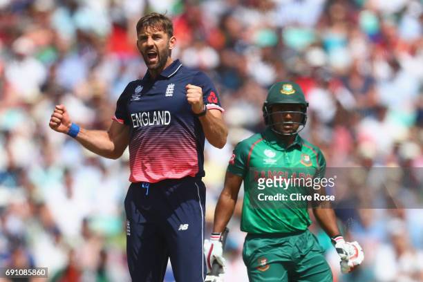 Liam Plunkett of England celebrates the wicket of Imrul Kayes of Bangladesh during the ICC Champions trophy cricket match between England and...