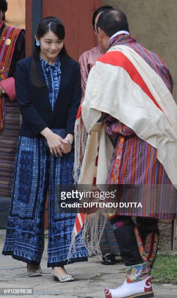 Japanese Princess Mako is welcomed by Bhutanese delegates at a Folk Heritage Museum in Thimpu on June 1, 2017. Japanese Princess Mako, the oldest of...